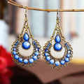 Long Cutout Earrings with Diamonds