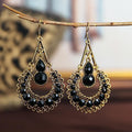 Long Cutout Earrings with Diamonds