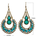 Long Cutout Earrings with Diamonds